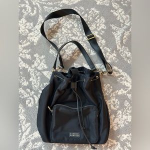Barney’s Leather trimmed bucket bag
